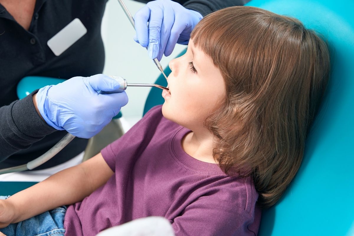 child girl getting checked pediatric sleep apnea and teeth grinding