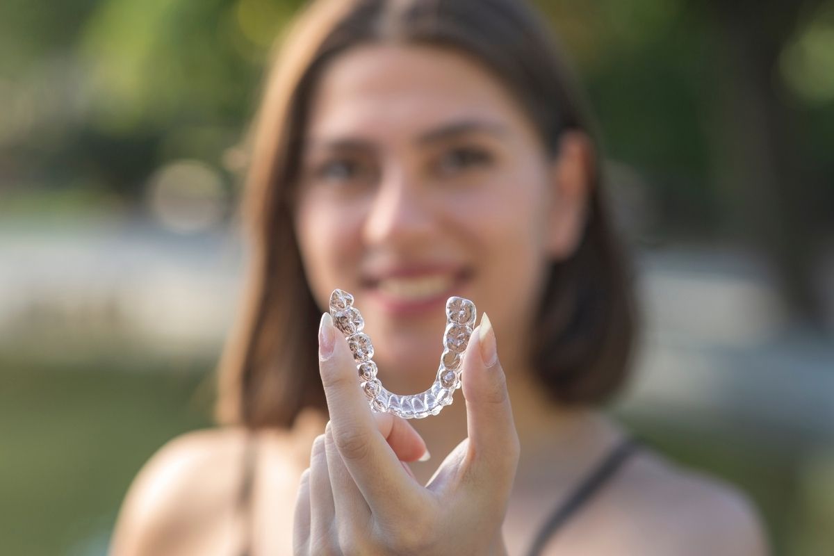 women with aligners Can Clear Aligners Really Close Gaps Permanently